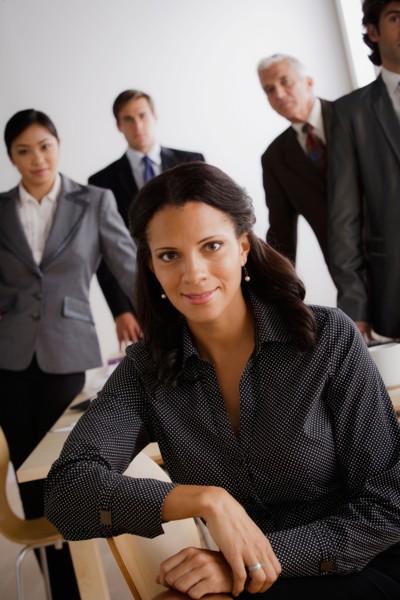 Studio shot of business people. Photo : Rob Lewine