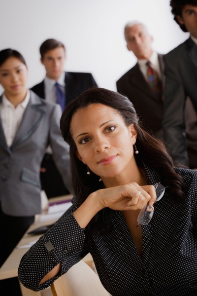 Studio shot of business people. Photo : Rob Lewine