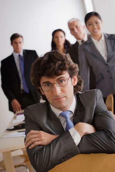 Studio shot of business people. Photo : Rob Lewine