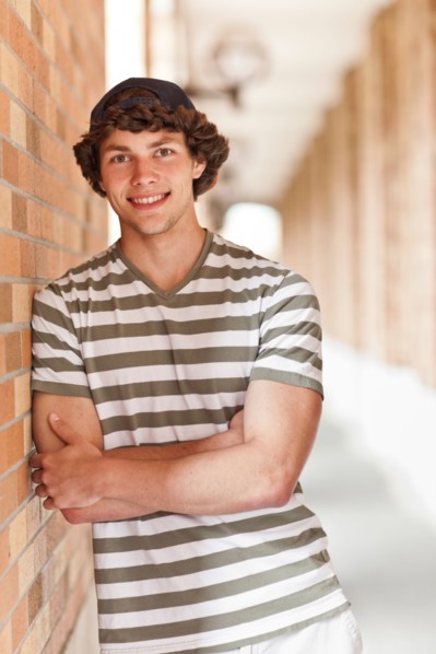 Portrait of man in corridor. Photo: Take A Pix Media