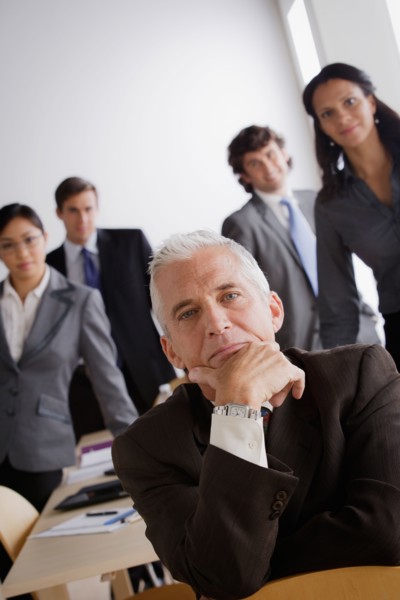 Studio shot of business people. Photo : Rob Lewine
