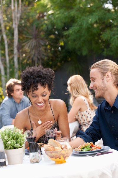 Couple dining in outdoor restaurant. Photo : Rob Lewine