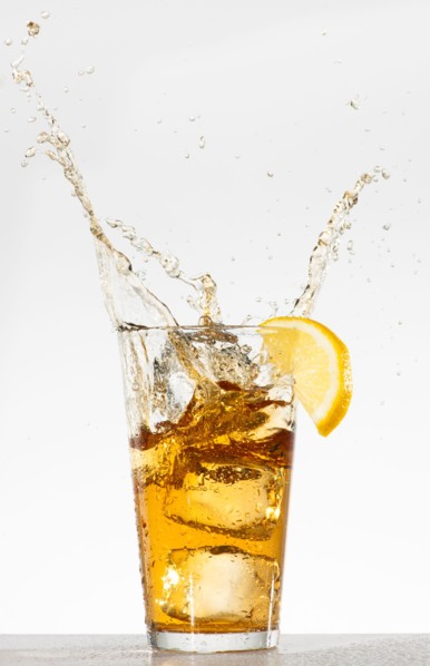 Studio shot of iced tea with splash.