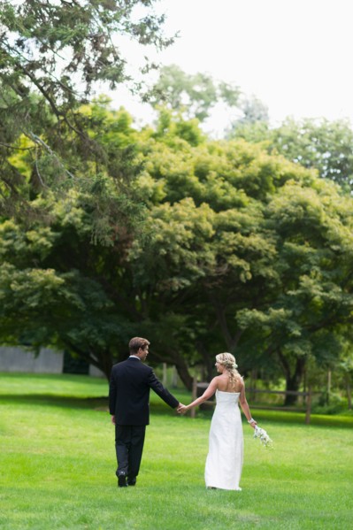 Newly wed couple walking together.