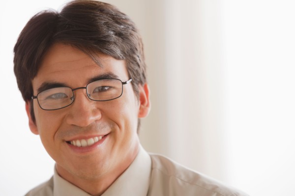 Portrait of business man smiling. Photo: Rob Lewine