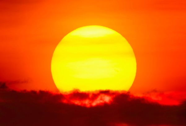 Large sun at sunset.