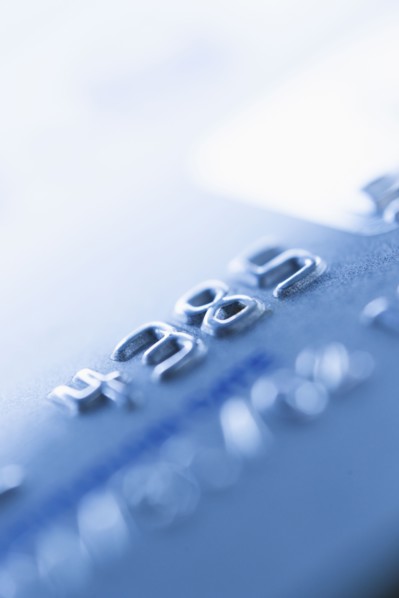 Detail of credit card, studio shot.
