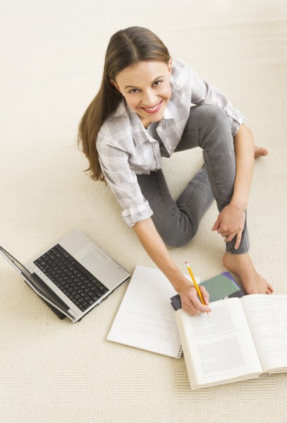 Woman studying at home.
