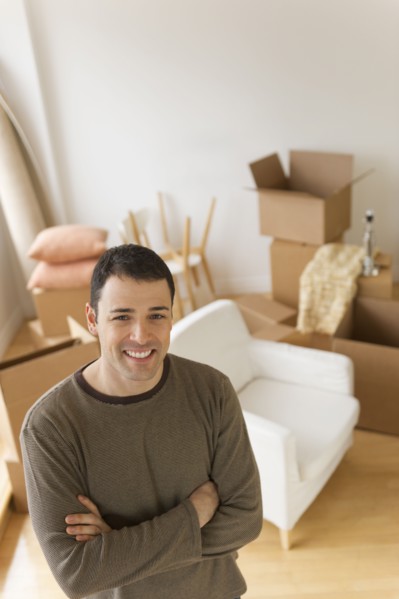 Portrait of man in new house.