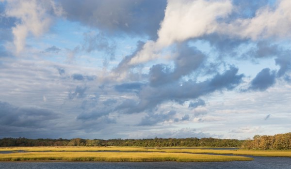 USA, New York, Long Island, East Hampton, Clouds over lake. Photo: fotog