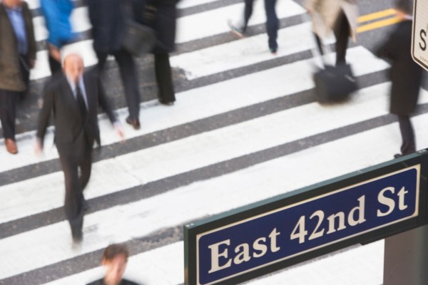 USA, New York City, Manhattan, 42nd street, Pedestrians on zebra crossing. Photo: fotog