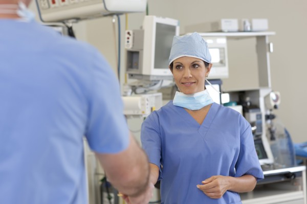 Surgeons in operating room. Photo : db2stock