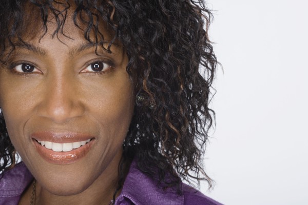 Studio portrait of mature woman. Photo : Rob Lewine