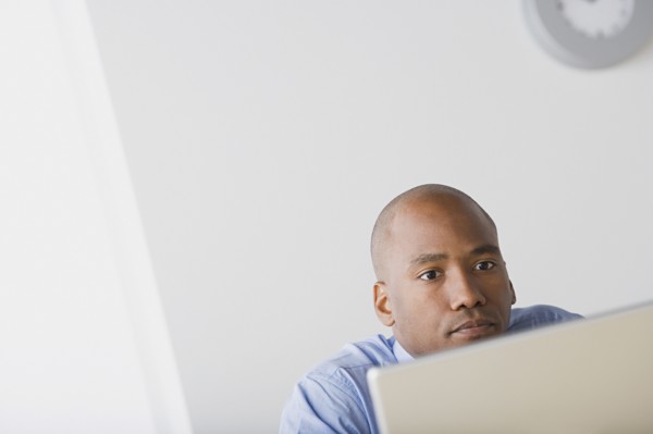 Businessman in office. Photo : Rob Lewine