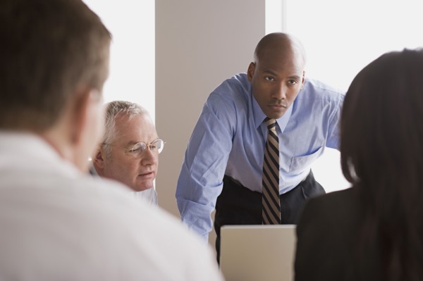 Portrait of business people in office. Photo : Rob Lewine