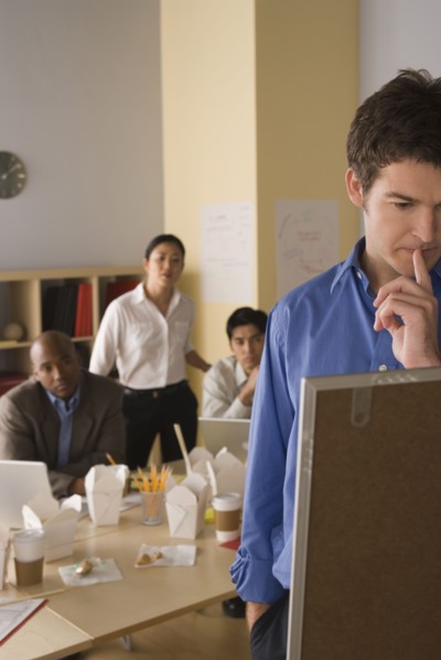 Business people working in office. Photo : Rob Lewine