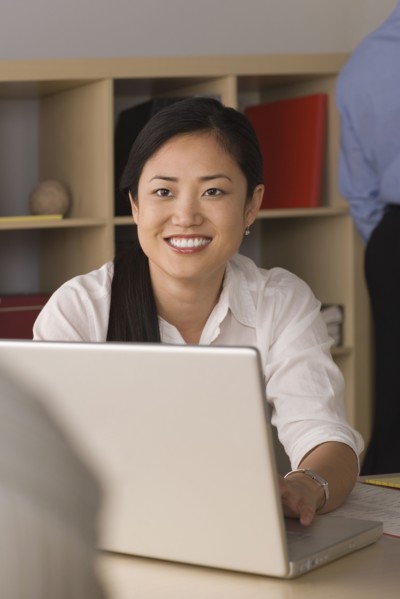 Portrait of businesswoman in office. Photo : Rob Lewine