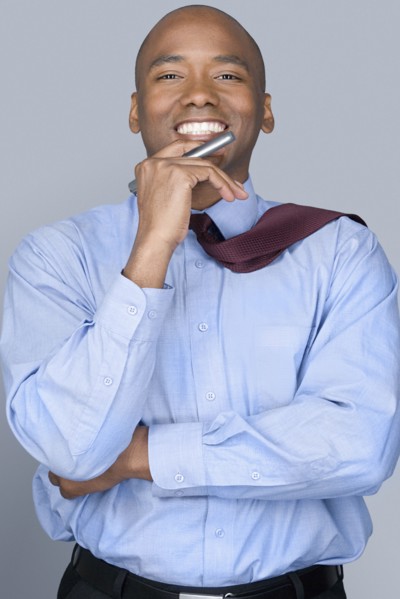 Portrait of mid adult businessman. Photo : Rob Lewine