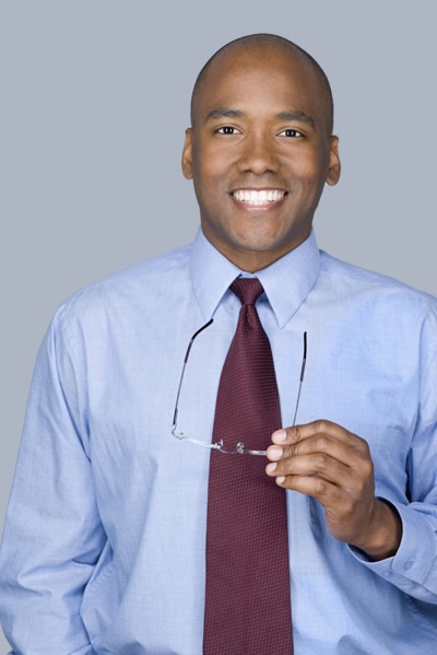 Portrait of mid adult businessman. Photo : Rob Lewine