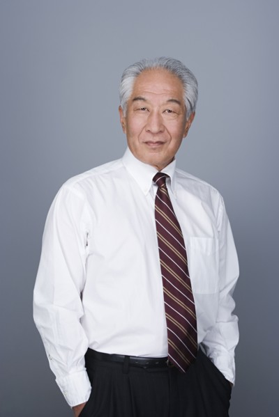 Portrait of happy senior businessman. Photo : Rob Lewine