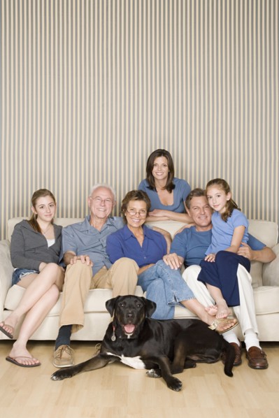 Portrait of three-generation family with two girls (8-9, 14-15) and dog. Photo : Rob Lewine