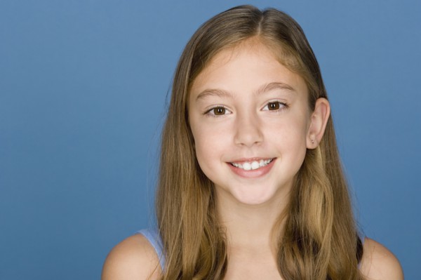 Portrait of happy girl (8-9). Photo: Rob Lewine