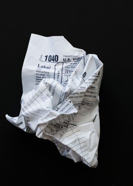 Studio shot of crumpled document.