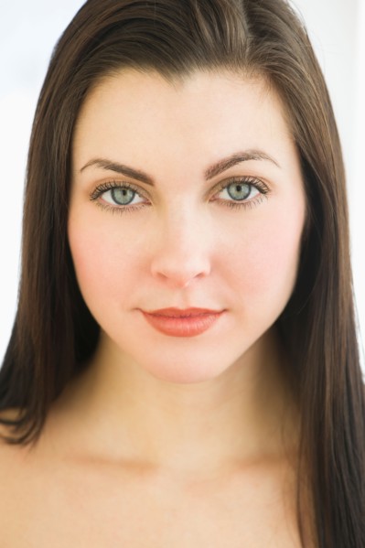 Studio portrait of young woman.