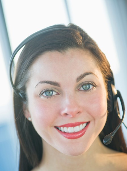 Portrait of female customer service representative.