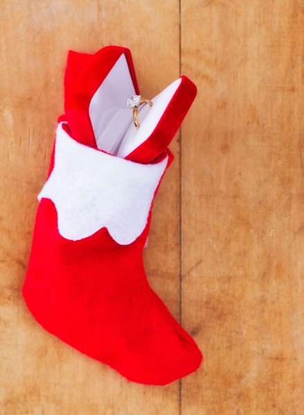 Christmas stocking with engagement ring. Photo : Daniel Grill