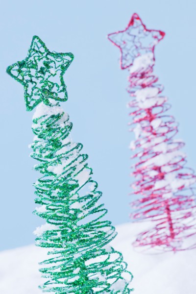 Studio shot of artificial Christmas trees. Photo : Daniel Grill