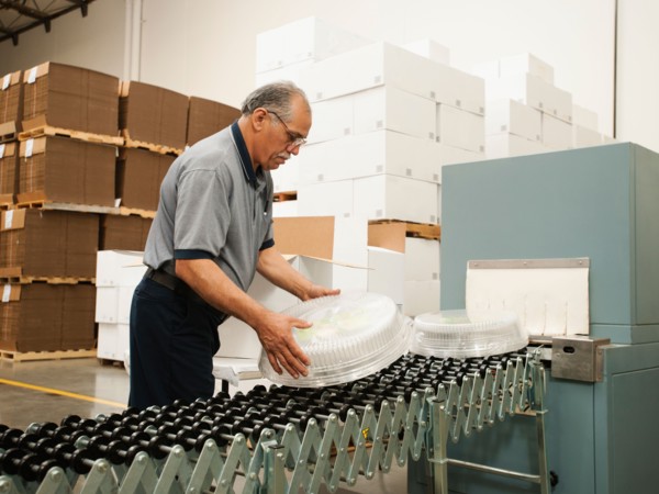 Warehouse worker assembling merchandise.