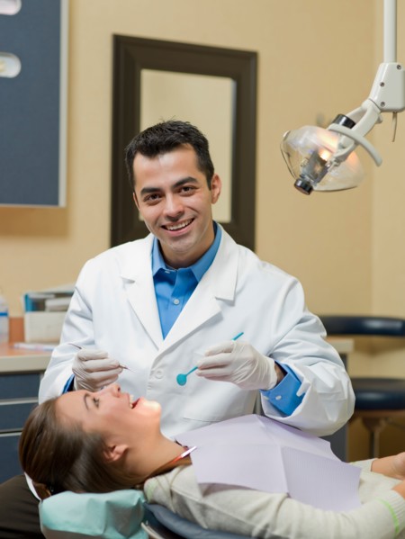 Dentist and patient in dental surgery. Photo : Dan Bannister