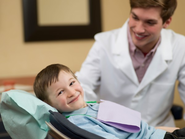 Dentist and patient in dental surgery. Photo : Dan Bannister