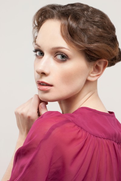 Portrait of beautiful young woman, studio shot. Photo : Jan Scherders