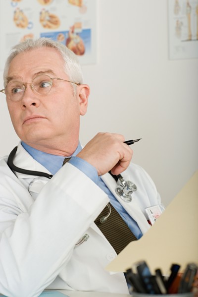 Senior doctor in office. Photo : Rob Lewine