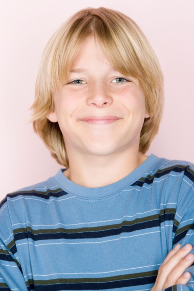 Studio shot portrait of teenage boy, close-up. Photo : Rob Lewine