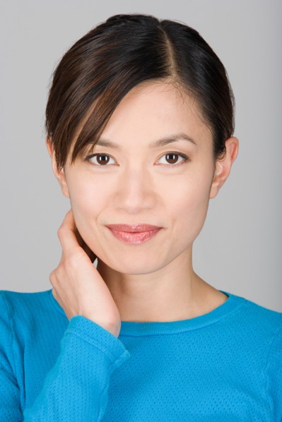 Studio shot portrait of mature woman, head and shoulders. Photo : Rob Lewine
