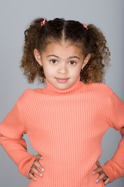 Studio portrait of confident pre-teen girl (10-11). Photo : Rob Lewine