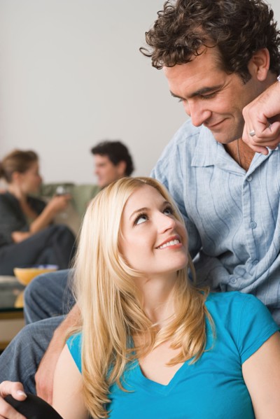 Couples at home party. Photo : Rob Lewine