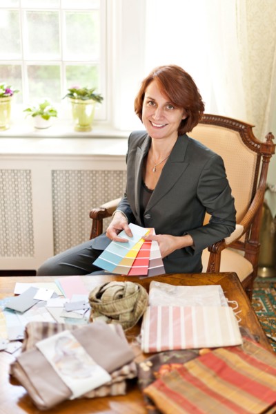 Woman checking color samples. Photo : Elena Elisseeva