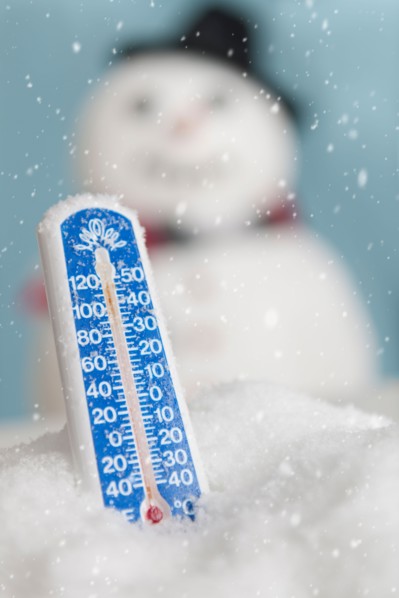 Studio shot of thermometer with snowman.