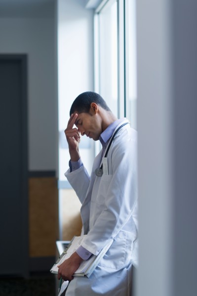 Doctor in corridor.