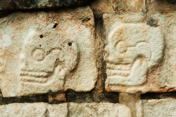 Mexico, Yucatan, Chichen Itza. Mayan carvings representing human skulls.