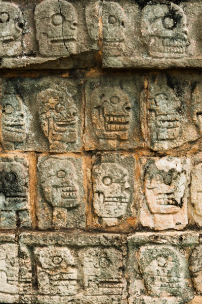 Mexico, Yucatan, Chichen Itza. Mayan carvings representing human skulls.