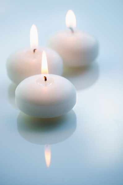 Studio shot of white candles.
