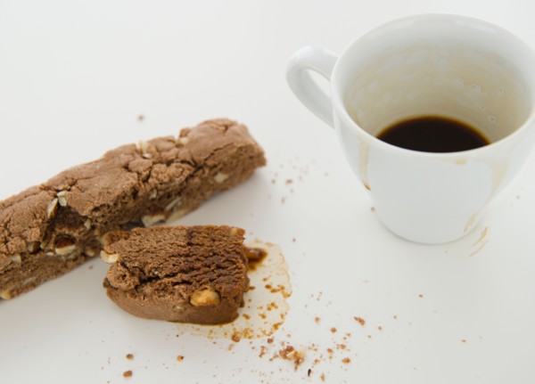 Close up of chocolate cake and cup of coffee, studio shot. Photo : Jamie Grill