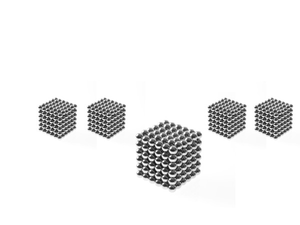 Studio shot of Pachinko balls arranged in group of cubes. Photo : David Arky