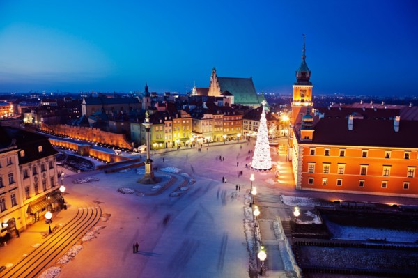 Poland, Warsaw. Castle Square, Sigismund's Column and Royal Castle in Christmas time. Photo :