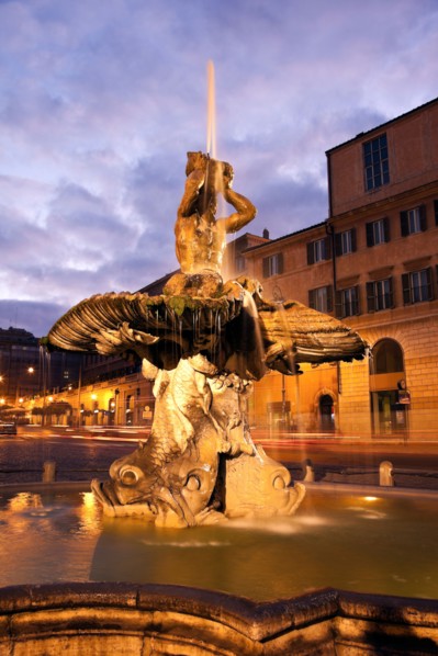 Italy, Rome. Piazza Barberini, Fountain of the Triton in early morning. Photo : Henryk Sadura